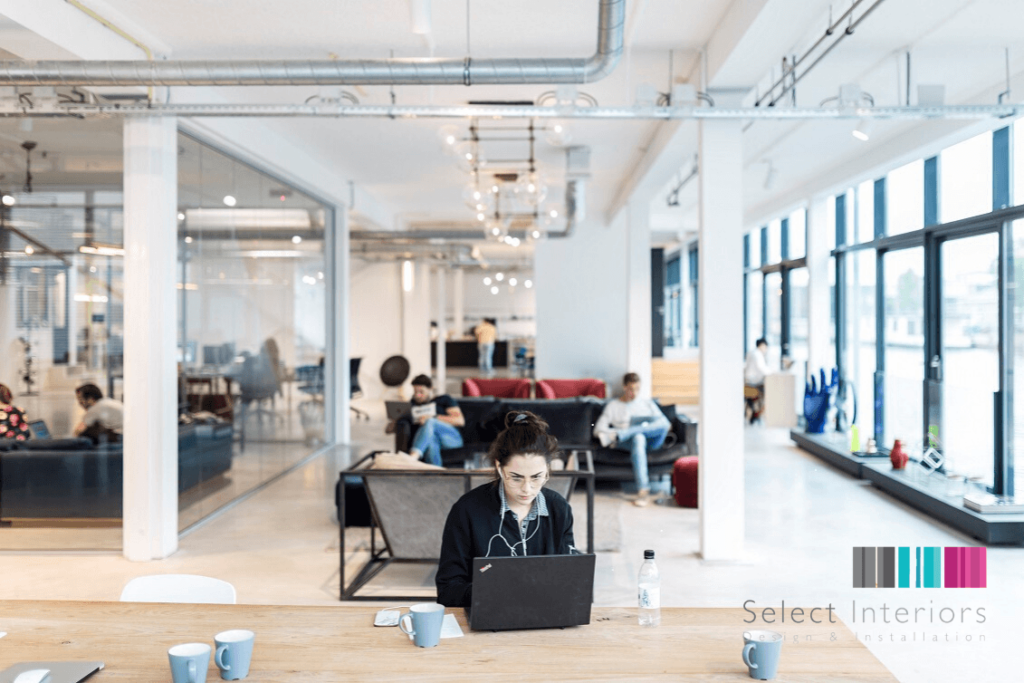 of a woman at a desk